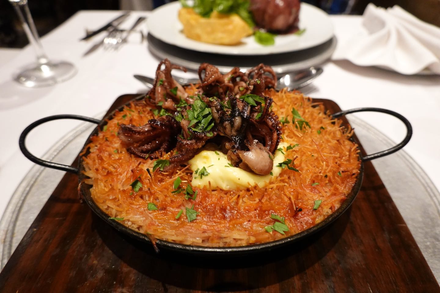Main course (fideua). San Honorato Restaurant