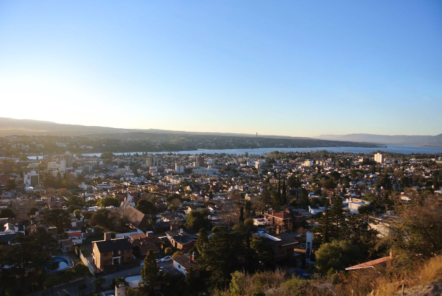 Panoramic view of Villa Carlos Paz at the sunset from the high grounds in the city.